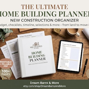 May include: A white three-ring binder titled The Ultimate Home Building Planner alongside a digital tablet, printed worksheets, a black pen, and paint swatches on a wooden surface. The text Dream Barns & More is visible on the binder cover.