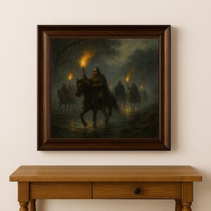 May include: A framed painting depicts a group of figures on horseback, illuminated by torches in a dark, forested setting. The artwork features a somber color palette with a focus on the riders and their fiery light sources, creating a dramatic and mysterious scene.