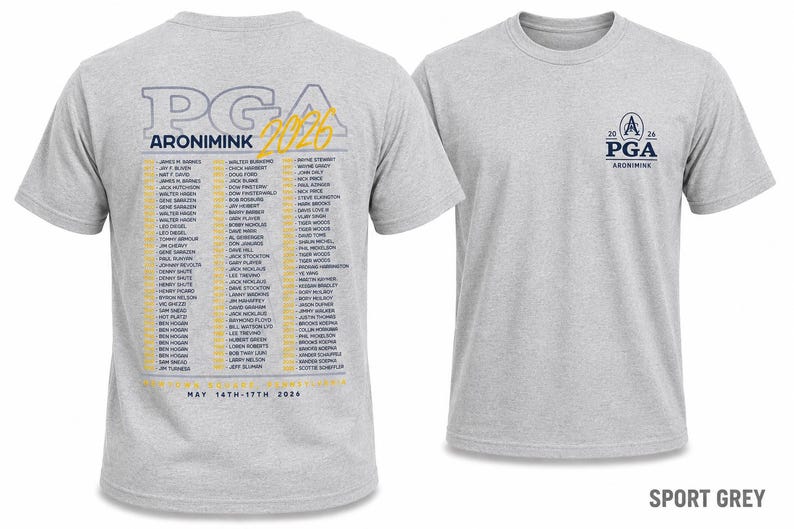 K&ouml;nnte beinhalten: Sportgraues T-Shirt mit dem PGA Aronimink 2026 Logo auf der Vorderseite und einer Namensliste auf der R&uuml;ckseite. Auf der R&uuml;ckseite des Shirts steht au&szlig;erdem der Text "MAY 14TH-17TH 2026".
