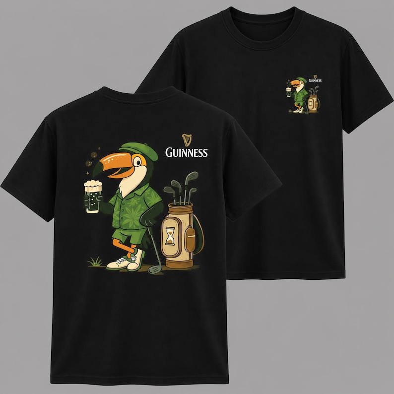May include: Black t-shirts featuring a cartoon toucan golfer with a pint of beer and golf clubs. The Guinness logo is displayed on the front and a smaller version on the back. The toucan wears a green hat and shorts.