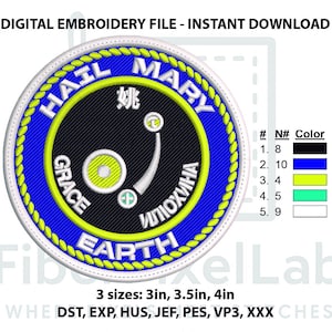 May include: A circular digital embroidery file design featuring a black center with a yellow and white graphic, surrounded by a blue border with a yellow rope-like edge. The text reads HAIL MARY GRACE EARTH and includes a Chinese character.