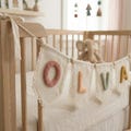 Personalized Nursery Name Banner | Custom Knitted Baby Bunting product logo