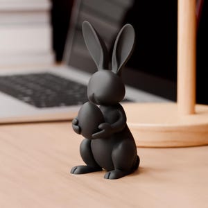 Figura de conejo de Pascua impresa en 3D: decoración navideña en blanco y negro