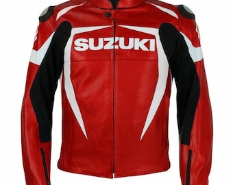 May include: Red leather motorcycle jacket with white and black accents. The jacket features the word "SUZUKI" in large white letters across the chest. It has a stand-up collar, zippered sleeves, and padded shoulders.