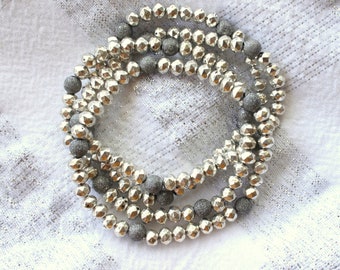 Beaded Stretch Bracelet with Silver Faceted metal beads and Gun Metal Stardust Accent Beads