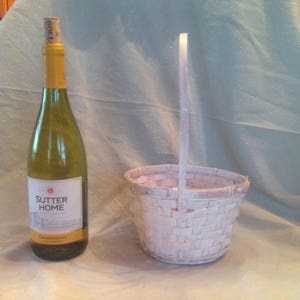 Eastertime Small round white washed wicker basket with handle