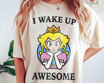 Maglietta carina con la principessa Peach di Super Mario, maglietta natalizia per famiglie con il mondo Nintendo, Yoshi Epic Universe, regali per il viaggio di compleanno a Universal Orlando