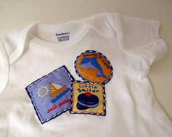 Dolphin Cove Little Sailor baby bodysuit or onesie size 6 to 9 months