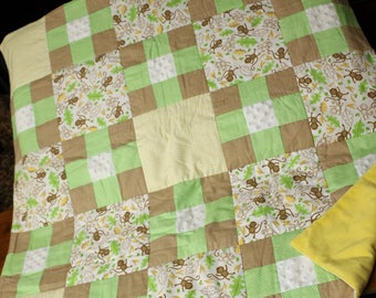 Monkeys Going Bananas baby patchwork quilt in light brown, green, yellow