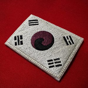 Koreanska befrielsearméns Taegeukgi broderilapp, Jingwansa-flaggan, självständighetsrörelsens kulturarvslapp