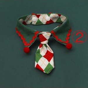 May include: Three festive pet collars with ties. The first is red and green with a Santa Claus pattern. The second is green, red, and white with a diamond pattern. The third is orange and black with a Halloween theme.