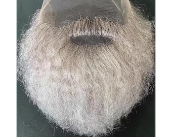 May include: A gray, full beard wig with a lace front and mustache. The wig features long, wavy hair and a natural appearance. The lace front is a fine mesh, designed for a seamless look. The beard is a light gray color.