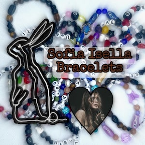 May include: A collection of colorful beaded bracelets with various charms and letter beads. The image includes a black and white outline of a rabbit, a heart-shaped image, and the text "Sofia Isella Bracelets".