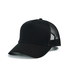 May include: A black trucker hat with a solid front panel and a mesh back. The hat has a curved brim and a button on top. This hat is a classic accessory for casual wear.