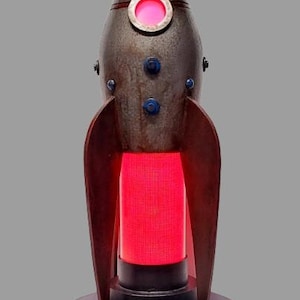 Handmade rocket lamp for the adventurous child&#39;s bedroom. LED, sound reactive and animated light scene modes. Remote, USB powered.