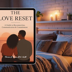 May include: A digital tablet displays the book cover of "The Love Reset." The cover features an illustration of a couple at sunset, with the title and subtitle text. The author's name is at the bottom. The tablet is in a bedroom setting.