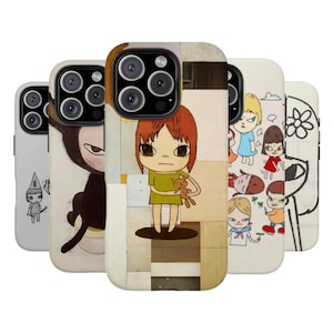 May include: A collection of five smartphone cases featuring various graphic illustrations of stylized characters with large eyes. The designs include a figure holding a small toy, a dark creature, and multiple figures in colorful clothing on a white background.