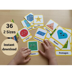 Pode incluir: Flashcards educativos com várias formas, como círculos, quadrados e corações, cada um com um rosto amigável. O conjunto inclui 36 cartões em 2 tamanhos, com as palavras "Download instantâneo" visíveis. Uma ferramenta de aprendizagem colorida.