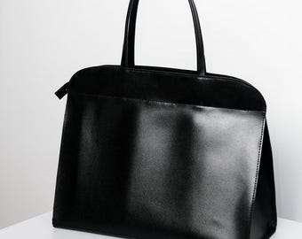 Bolso tote extragrande de piel negra: bolso rígido para llevar a diario.