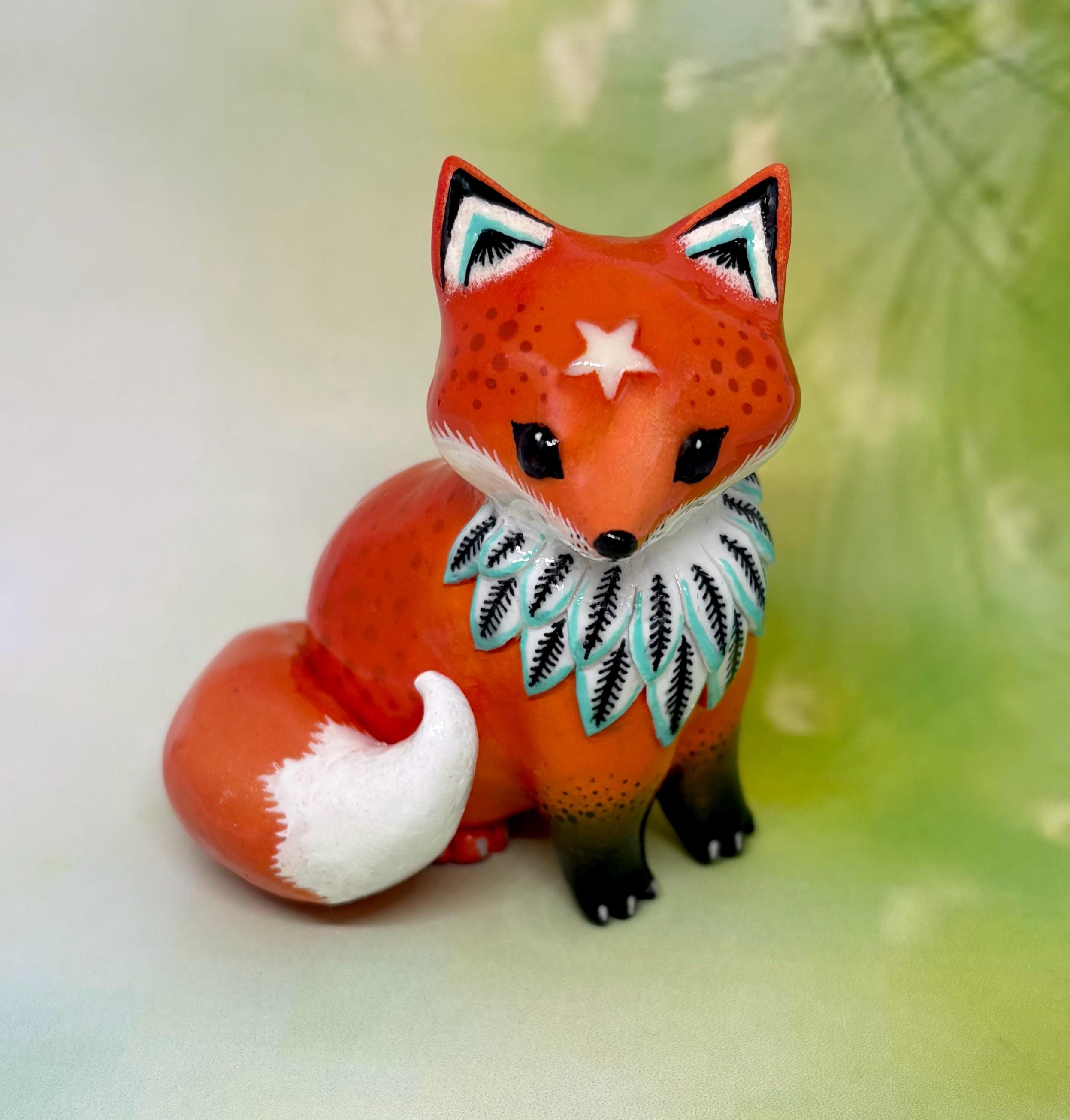 赤い粘土フィギュア il_fullxfull.7034158847_rqaz.jpg