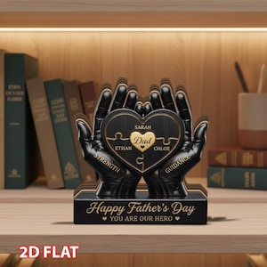 May include: A black wooden Father's Day gift featuring a heart-shaped puzzle held by two hands. The puzzle has the word "Dad" in the center, with names around it. The base reads "Happy Father's Day, You Are Our Hero."