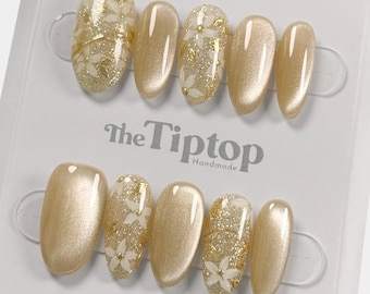 Uñas postizas doradas / Uñas reutilizables / Uñas con purpurina / Uñas efecto ojo de gato / Uñas primavera-verano / Uñas ovaladas medianas / J05