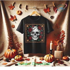 May include: Black t-shirt featuring a skull design with red roses and a decorative gold frame. The shirt is hanging on a wooden hanger, with pumpkins, leaves, and candles in the background. The text "Instant Download" is at the bottom.