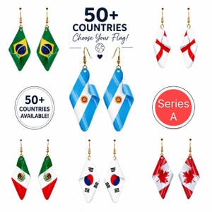 May include: Six pairs of diamond-shaped dangle earrings featuring various national flags, including Brazil, Argentina, England, Mexico, South Korea, and Canada. Each pair has gold-tone hooks. Text reads 50+ COUNTRIES CHOOSE YOUR FLAG!, 50+ COUNTRIES AVAILABLE!, and Series A.