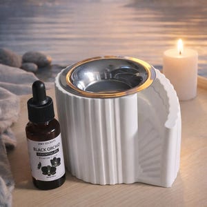 Bruciatore di aromi in ceramica per scale, diffusore di oli essenziali a cera fusa, complemento d'arredo moderno.
