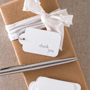 Set of 10 letterpress 'Thank you' tags || 40 x 65mm scalloped - White paper