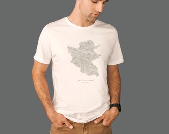 May include: White t-shirt featuring a detailed map of the Yorkshire Dales printed on the front. The text "Yorkshire Dales" is printed below the map.