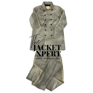 May include: A gray suede jacket and matching pants set. The jacket is double-breasted with black buttons and beige stripes on the sleeves. The text "The Jacket Xpert" and "House of Fashion USA" are visible.