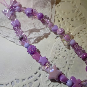 Whimsical Fairy Phone Charm – Pastel Lavender Beaded Accessory with Bows, Stars, & Butterflies