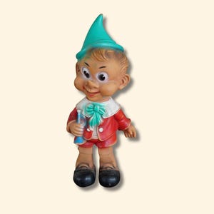 Vintage 1970s Pinocchio Rubber Figure: Large Hand-Painted Collectible