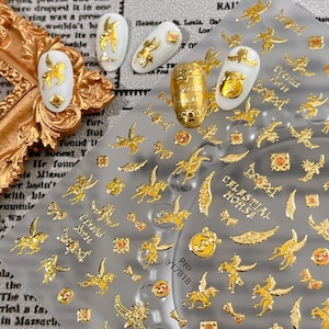 May include: Gold nail art stickers with celestial horse designs, gold nail polish, and white nail polish with gold accents. The stickers include the text "Celestial Horse" and "YT7818".