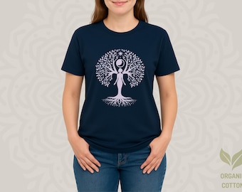 May include: Navy blue t-shirt featuring a light purple tree of life design. The tree includes a woman figure, roots, and a celestial crown with a star and crescent moon. The shirt is made of organic cotton.