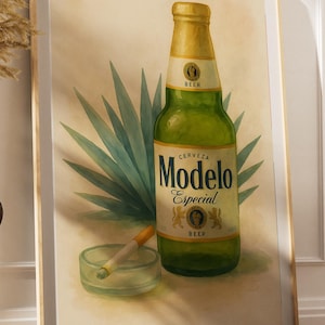 May include: A framed print depicting a green Modelo Especial beer bottle with a gold label, a lit cigarette in a glass ashtray, and blue agave leaves. The artwork has a vintage style, with a neutral background and a gold frame.