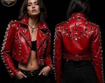 May include: A red leather cropped jacket with gold-colored studs. The jacket features a notched collar, long sleeves, and a belt at the waist. The jacket is shown from the front and back views.
