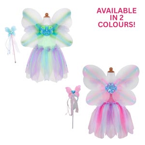 May include: Two fairy costume sets, each featuring sheer butterfly wings, a layered tulle skirt, and a matching wand. One set is in shades of green, blue, and purple, while the other is in pink, blue, and purple. Text reads: AVAILABLE IN 2 COLOURS!