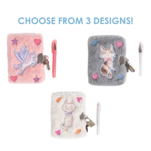 May include: Three fuzzy journals with locks and keys, each accompanied by a matching pen. The text CHOOSE FROM 3 DESIGNS! appears above. The journals are pink with a unicorn, gray with a cat, and white with a cat, all featuring glittery accents.