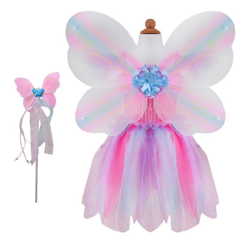 May include: A fairy costume set consisting of a dress with a multi-layered pink and purple tulle skirt and a pair of large, translucent iridescent wings with pastel accents. A matching wand features a pink butterfly and long ribbons.