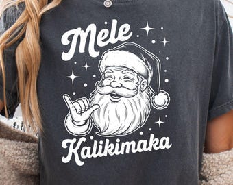 Mele Kalikimaka Shirt, Hawaiian Santa Shaka Tee, Tropical Christmas Graphic
