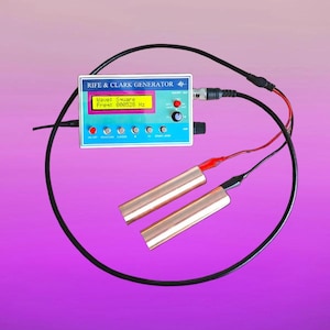May include: A Rife & Clark Generator with a blue and white control panel, a digital display, and two copper cylinders. The display shows "Wave: Square Freq: 000528 Hz". Black wires and red and black connectors are attached.