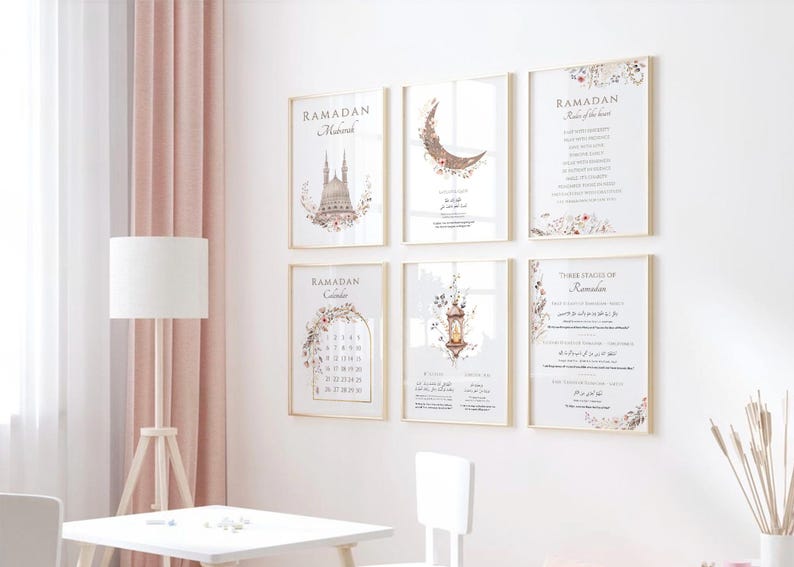 May include: Six framed art prints with gold frames are displayed on a white wall. The prints feature floral and architectural designs, along with text related to Ramadan. The color palette includes beige, white, and gold.