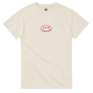 May include: Cream-colored t-shirt with a red oval graphic. The graphic features the equation "X = ℵ" and the words "some kind of nothing" in a circular arrangement. The shirt has short sleeves and a crew neck.