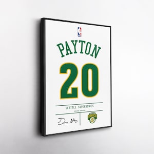 May include: Framed print of a Seattle SuperSonics basketball jersey. The jersey features the name "PAYTON" in green, the number "20" in green and gold, and the team logo. The frame is black.