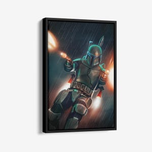 May include: Framed artwork featuring a character in green and gray armor, firing weapons with orange blasts. The character is set against a dark, rainy background, with bright light effects. The artwork is in a black frame.