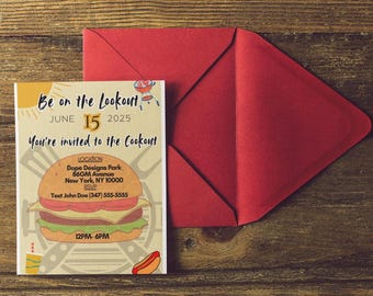 May include: A cookout invitation with a red envelope on a wooden surface. The invitation card features a burger illustration and text that reads "Be on the Lookout, June 15, 2025, You're invited to the Cookout". Includes location and RSVP details.