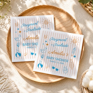 May include: Two square baby shower napkins with a striped background. The napkins have the text "Pregnant + Poolside Amelia's BABY SHOWER MARCH 12, 20XX" and feature illustrations of a swan, sunglasses, and a beach ball.