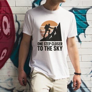 One Step Closer to the Sky Mountain T-Shirt – Hiking Adventure Unisex Tee